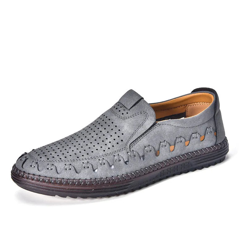 Men's brown slip-on casual shoes with round toe and flat sole shown on a white background