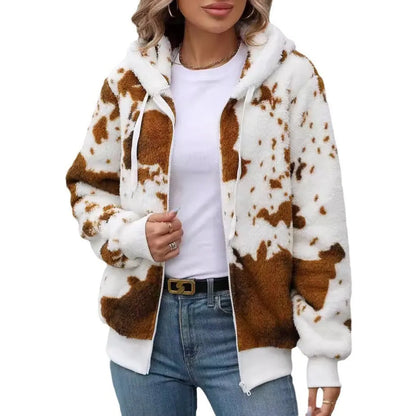 Yellow and brown cow print pattern on a soft, hooded zip-front plush cardigan jacket for streetwear.