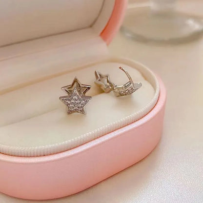 White star zircon earrings for women with copper base and electroplated finish, geometric shape, one pair