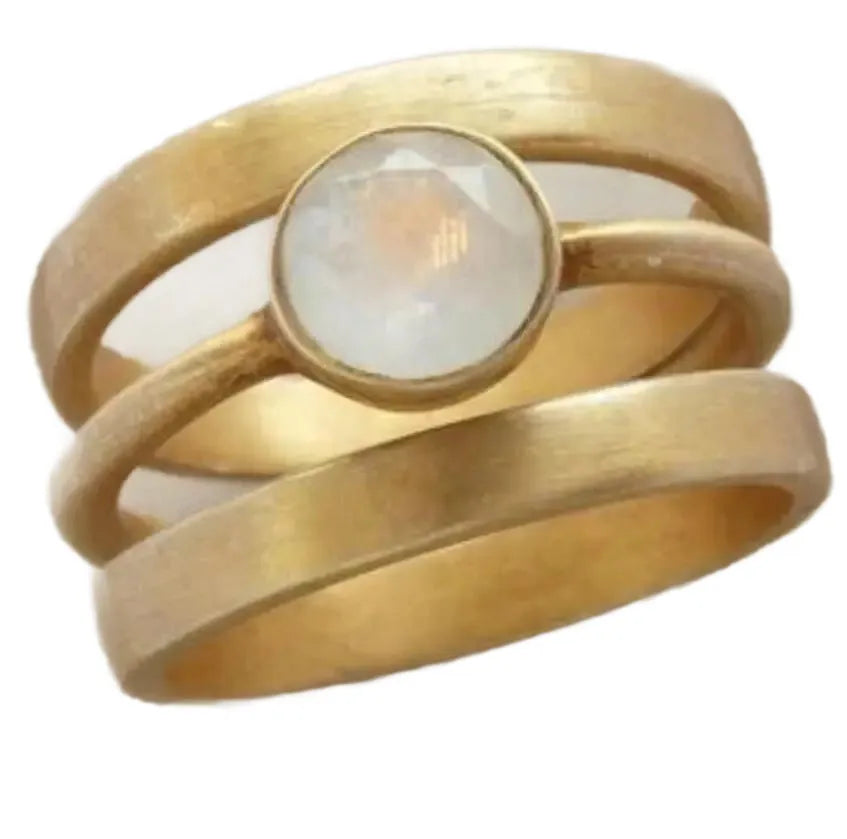 Gold-plated geometric ring with hollow design and white chalcedony stone on titanium steel band
