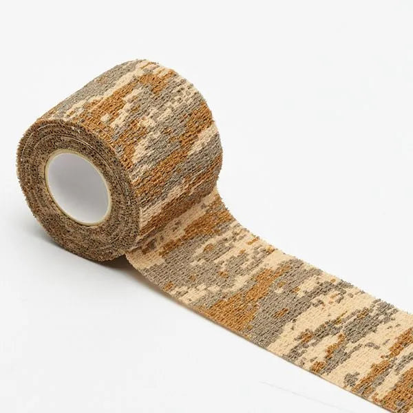 Roll of non-woven elastic camouflage bandage tape in a forest pattern, 4.5 metres long and 5cm wide.