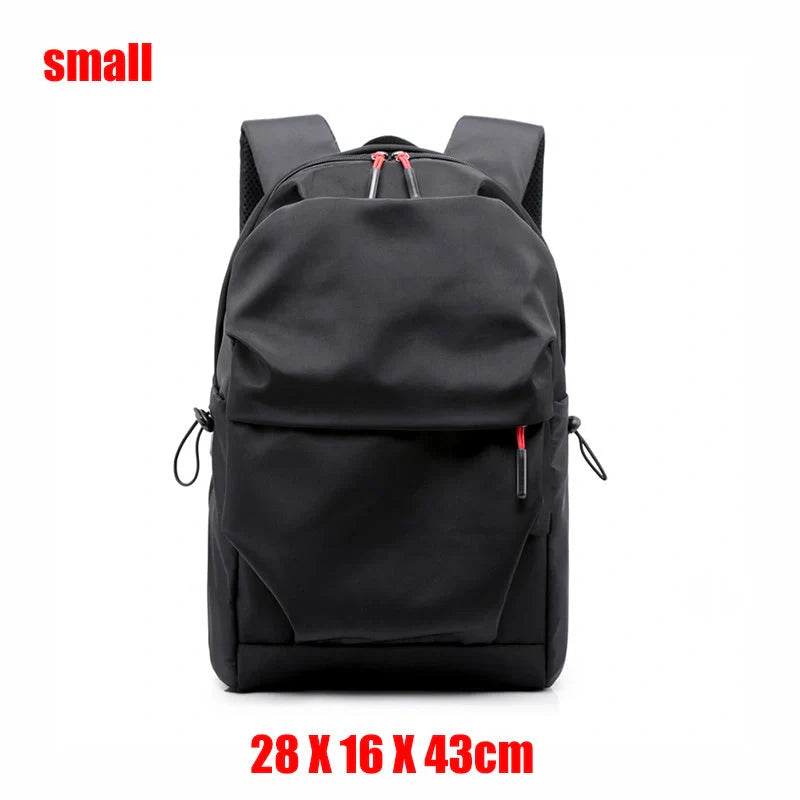 Sleek and durable nylon backpack with spacious compartments for everyday use.