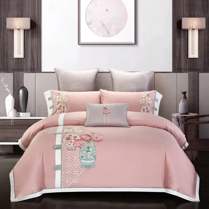 Four-piece cotton embroidery bedding set in satin weave with decorative patterns