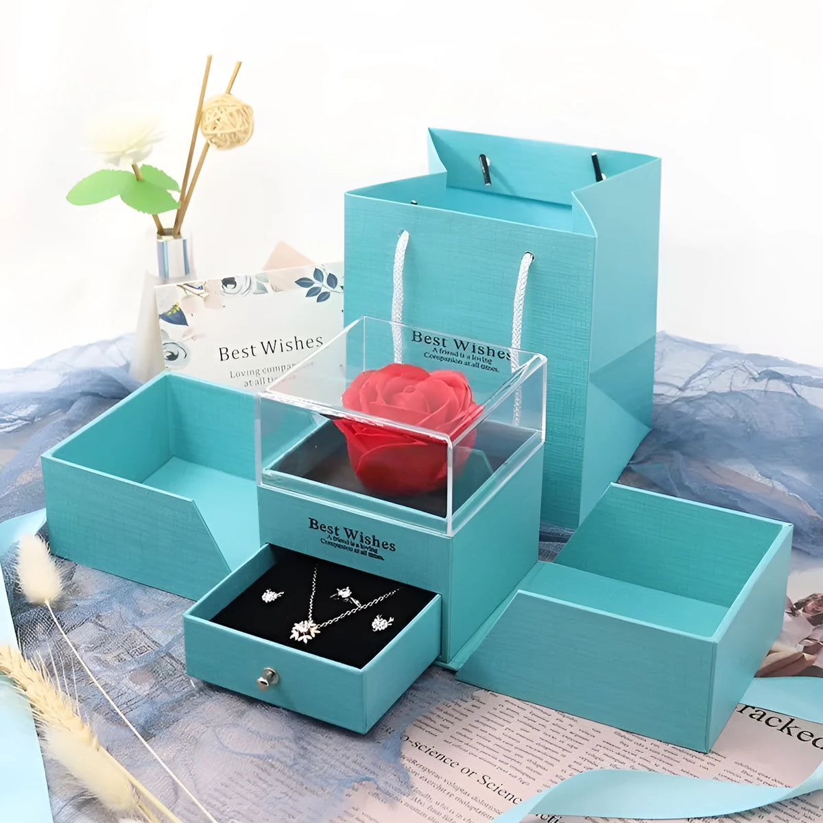 Blue jewellery gift box with plastic eternal flower decoration for Valentine's Day accessories storage