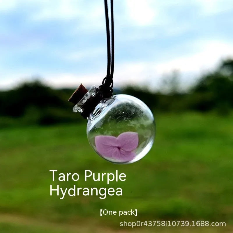 Glass fire extinguisher-shaped car perfume pendant with preserved flowers inside