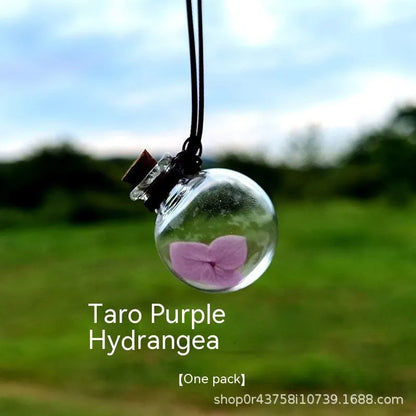 Glass fire extinguisher-shaped car perfume pendant with preserved flowers inside