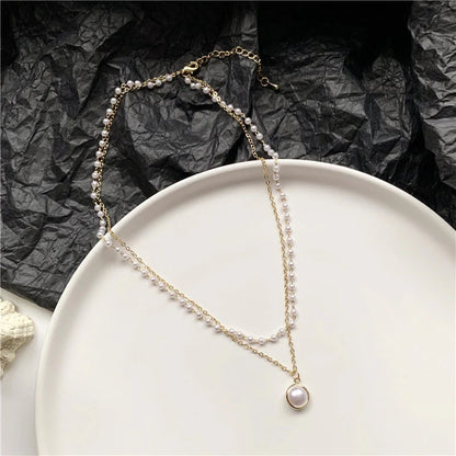 Gold geometric double-layer pearl necklace with adjustable chain