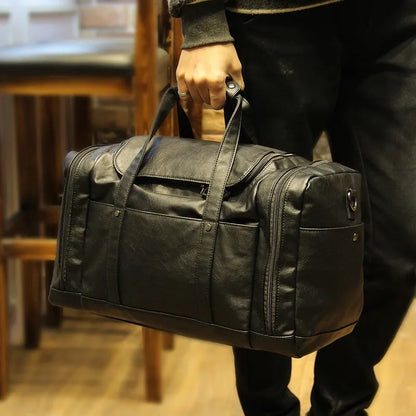 Black PU men's travel bag, 50cm wide and 26cm high, with phone, cigarette, and hidden zipper bags