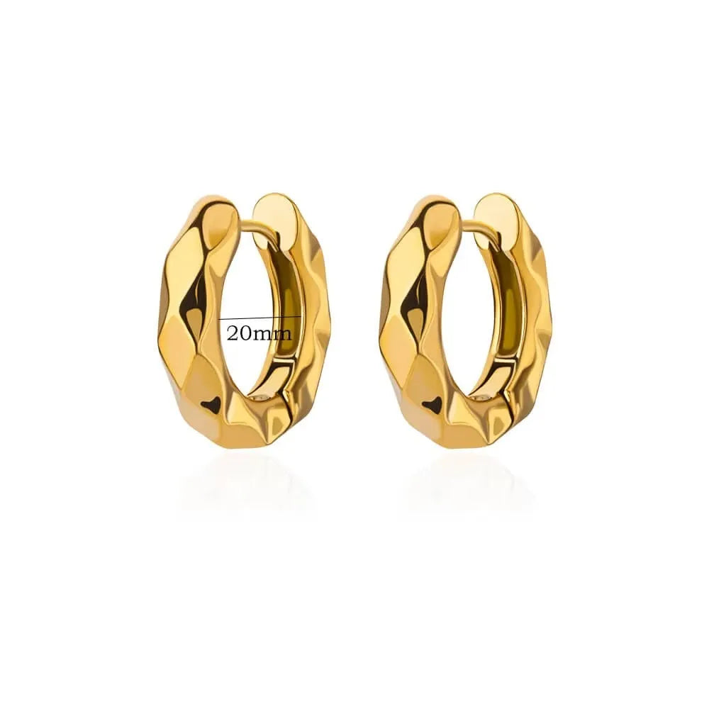 Women's irregular geometric butterfly earrings in copper with diamond treatment, showing heart-shaped and star designs in various colours