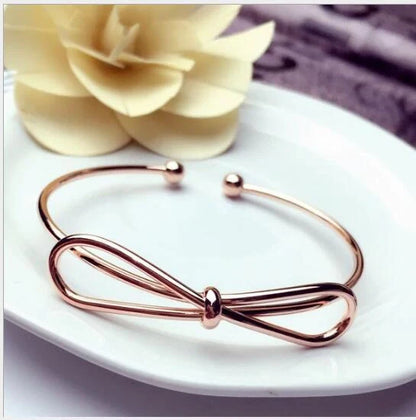 Elegant Knot O-Type Metal Openwork Bracelet with unique design for stylish women