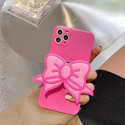 Rose red TPU iPhone case with integrated bow-shaped viewing stand