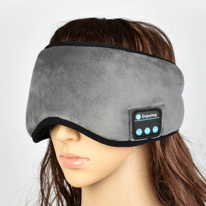 Black contoured eye mask with adjustable straps showing measurements of 20cm width and 10cm height