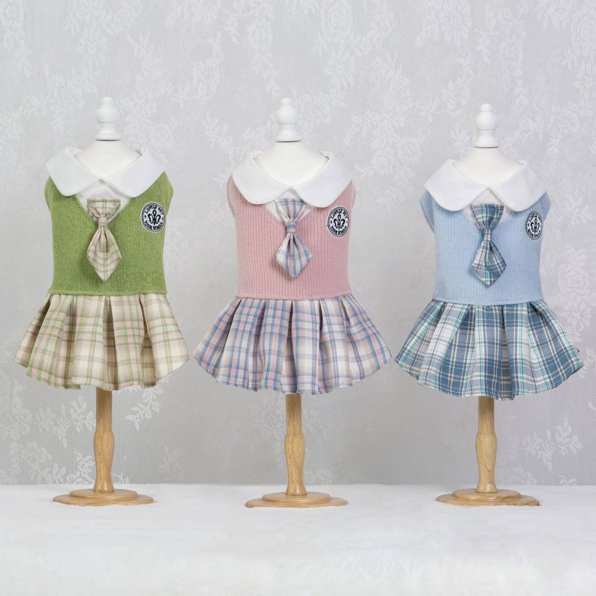 A pink, blue, or green tartan skirt for dogs and cats, shown in a princess style.