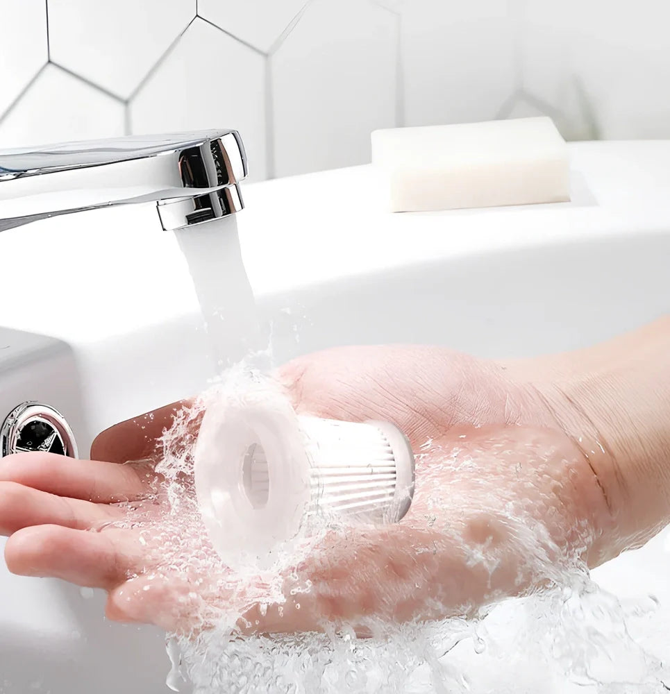 Black cordless car vacuum with suction head and brush attachment, 16.5cm size