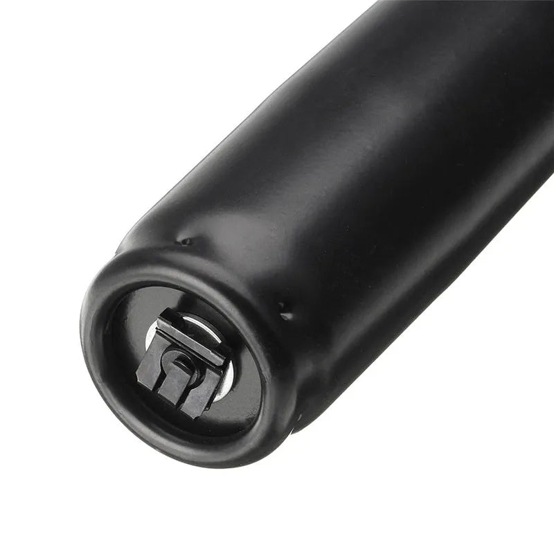 Gas spring for manual lift chair assembly in black paint and silver electroplated finishes.