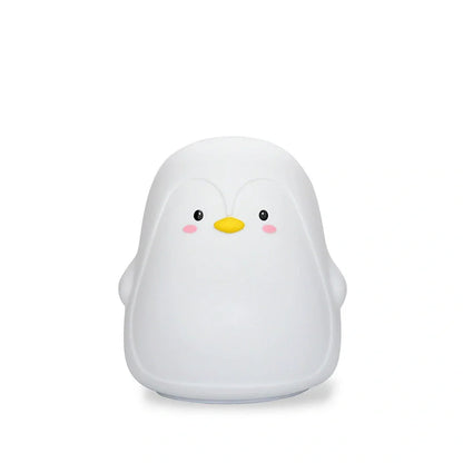 Penguin-shaped night light with soft white LED illumination and USB charging port