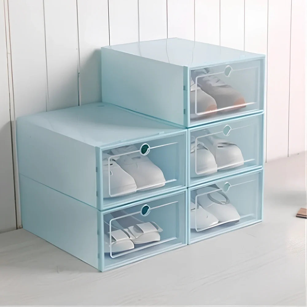 Transparent plastic shoe box showing stackable design and clear construction