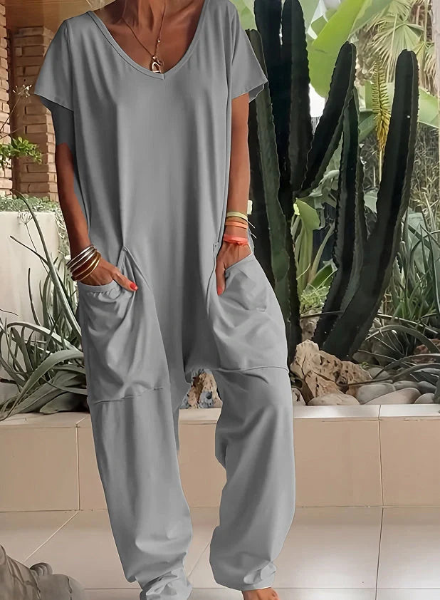 A stylish and comfortable oversized jumpsuit with roomy pockets, available in a variety of vibrant colors.
