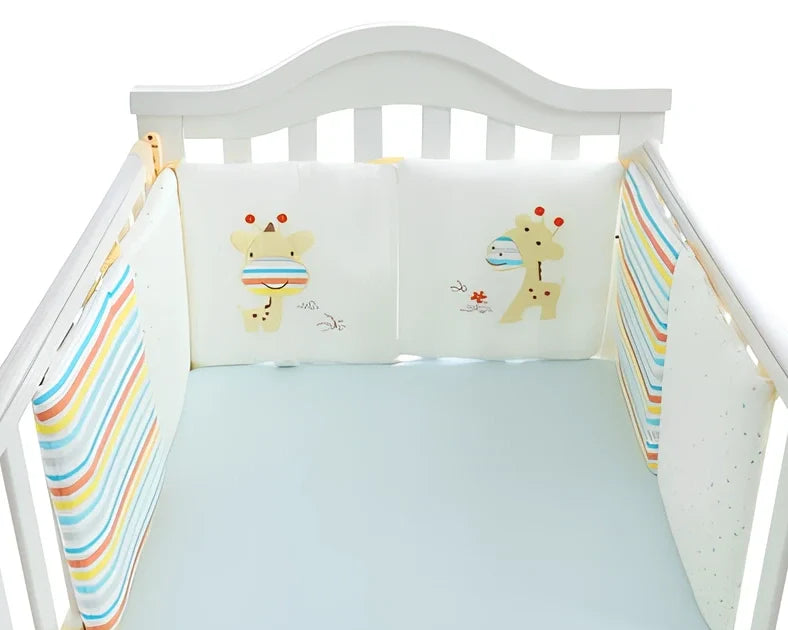 Six 30x30cm cotton baby bed protection panels with hard cotton filling arranged around crib