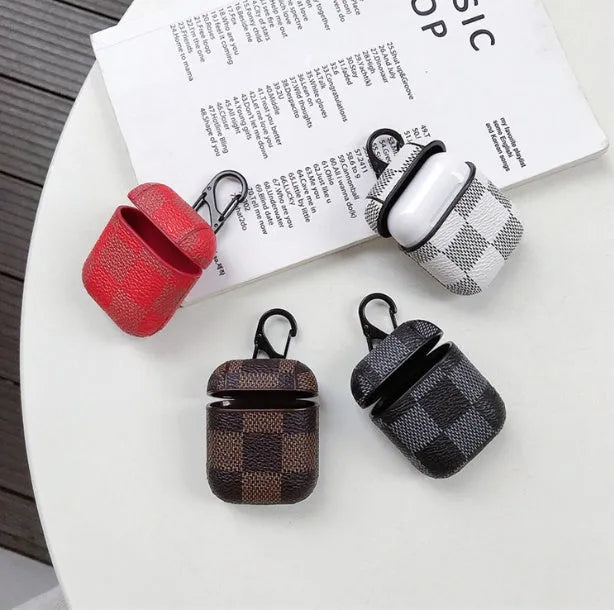Apple iPhone XS Max protective case, a compatible wireless Bluetooth headset case with anti-lost hook, constructed from a leather-look lattice hard plastic shell in a choice of four colour options including black, brown, red, and white grid styles.