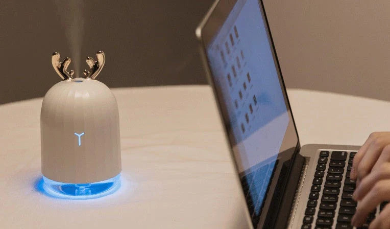 Compact deer-shaped humidifier with USB power for small spaces up to 100 square feet