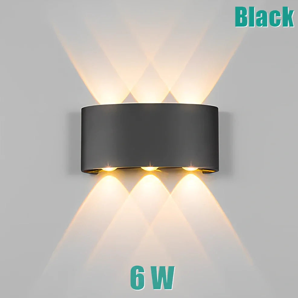 Waterproof black aluminium LED wall lamp 4W warm white emitting 60-degree beam angle mounted on white wall