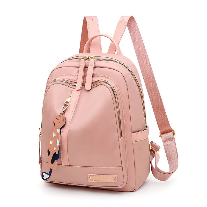 Black square vertical nylon backpack with double shoulder straps showing multiple compartments and anti-theft features