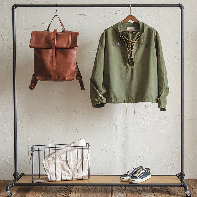 Rugged military-style hooded jacket for men made of durable cotton fabric with wind-resistant features and classic design