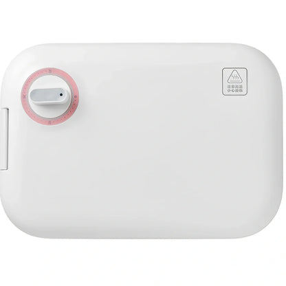 White mini breakfast machine with metal construction measuring 12x11cm for single-person cooking