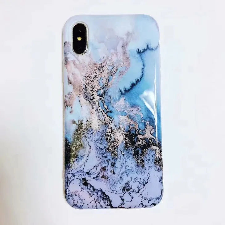 Colourful stone pattern soft back phone case for iPhone on a table.