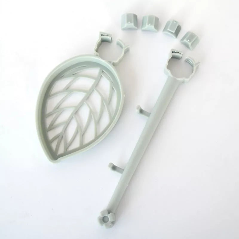 Clip-on adjustable sink drain basket in light green and pink for sponges and rags