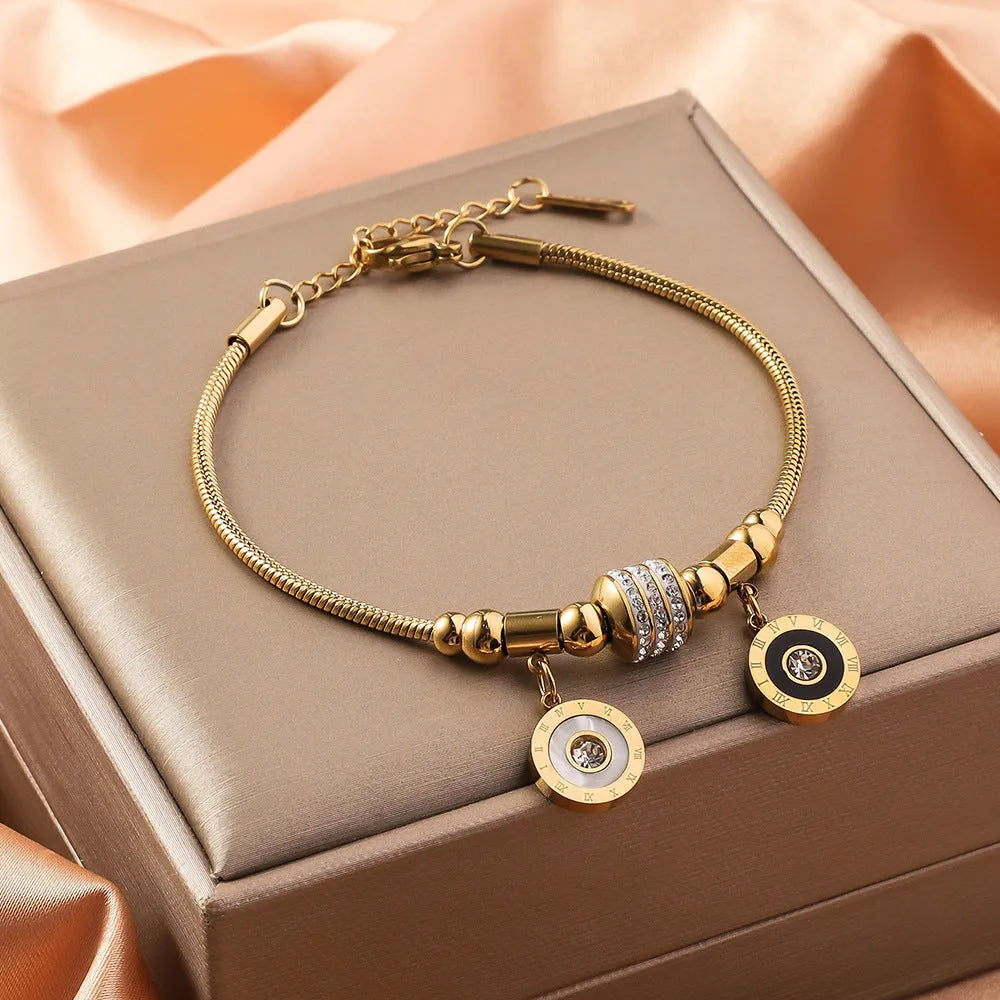 Titanium steel inlaid shell bracelet with electroplated finish showing pattern variation options