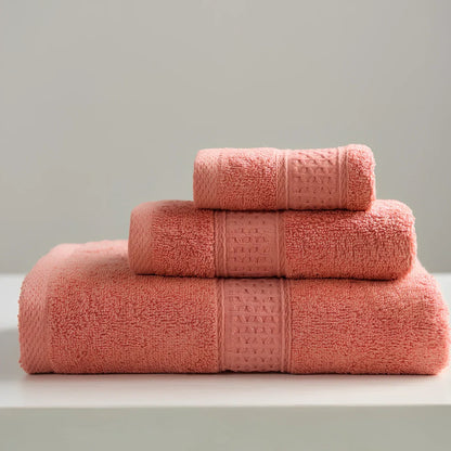 Three cotton towels: 33cm square, 32cm×73cm standard, 70cm×140cm bath towel in coordinated colours