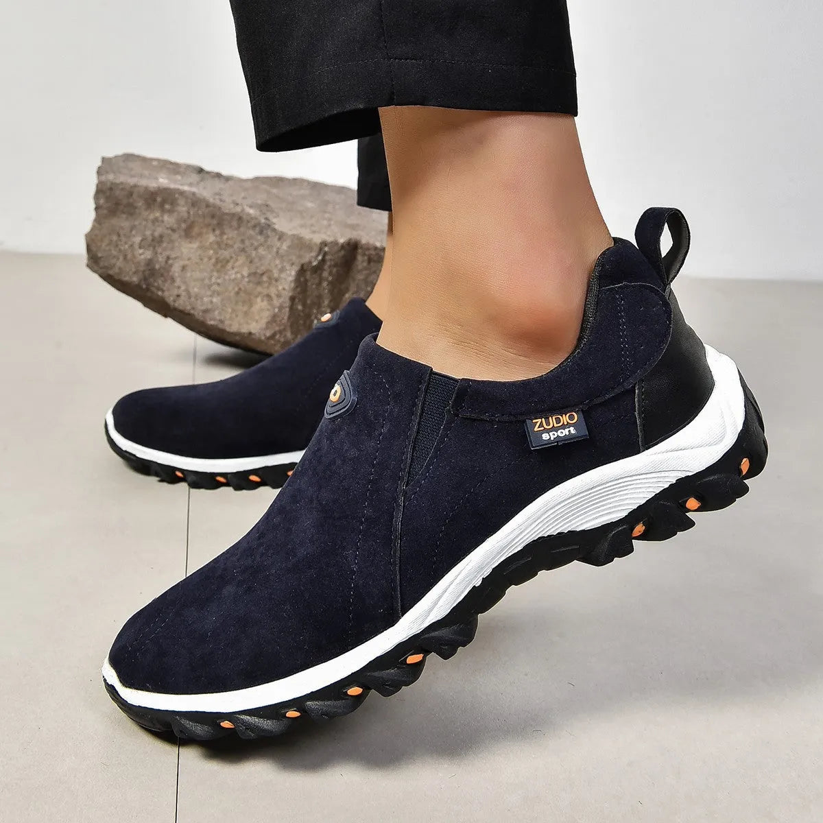 Men's round head shallow mouth thin slip-on shoes in black, blue, gray, green, and light brown on a white background.