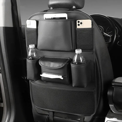 Genuine leather hanging storage bag attached to the back of a car seat in brown.