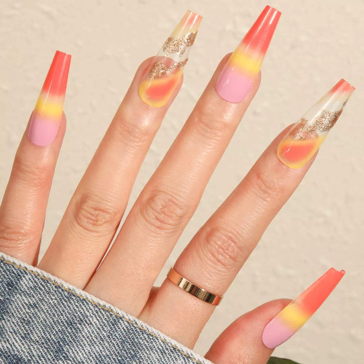 Rainbow gradient fake nails with marble pattern, long and pointed design