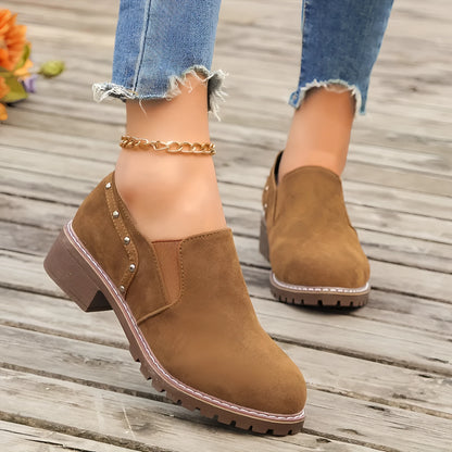 Light brown plus size women's suede ankle boots with a thick low heel and elastic band side closure.