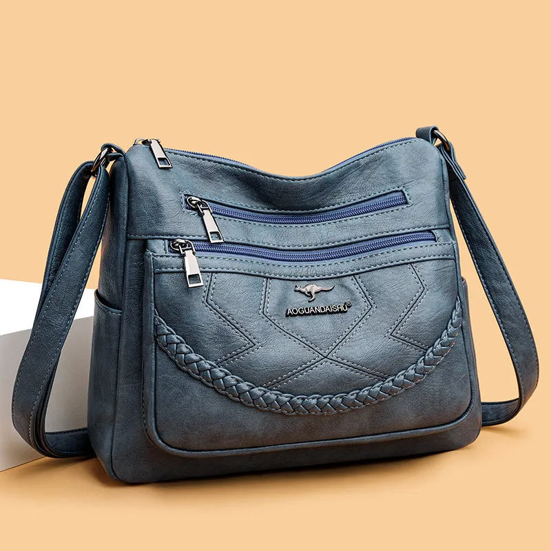 Soft leather fashion shoulder bag in horizontal square design with multiple internal pockets