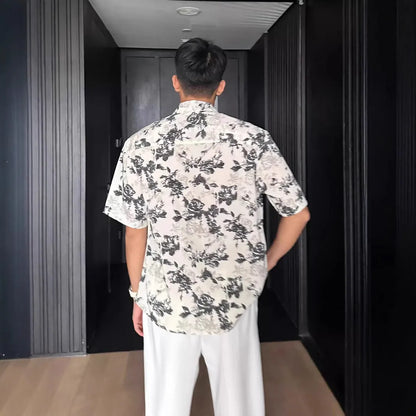 Loose casual short sleeve shirt with floral printed pattern in black colour option