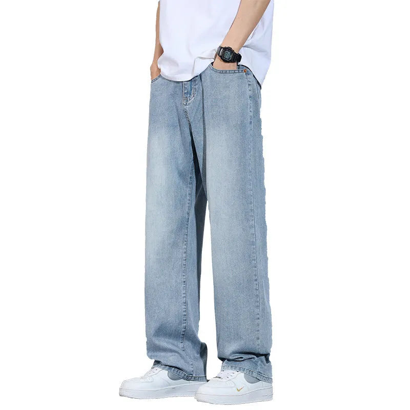 Straight-leg casual trousers in thin denim fabric with zip fly placket, available in UK2560 blue, grey, light blue, and vintage blue colours