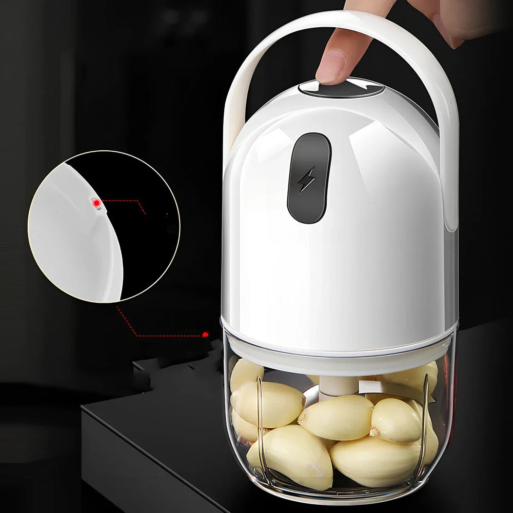 White electric garlic masher with USB cable, showing 280ml capacity chamber and compact 9cm width design