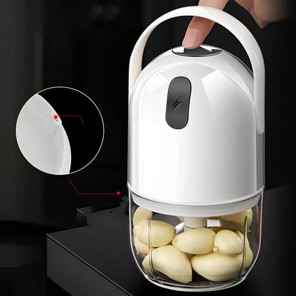 White electric garlic masher with USB cable, showing 280ml capacity chamber and compact 9cm width design