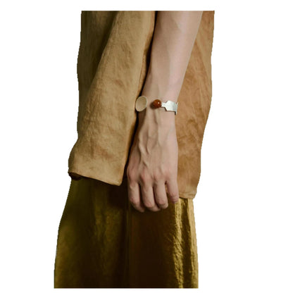 Electroplated alloy ring and bracelet with spoon and pork motifs and diamond shapes