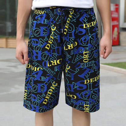 Man wearing loose-fitting striped beach pants made from quick-dry ice silk fabric.