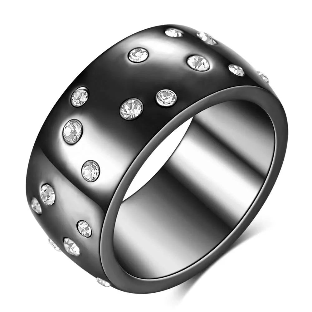 Geometric titanium steel women's couple ring with diamond treatment in black, gold, rose gold, and steel colours.