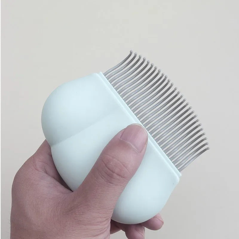 Blue Paw Soft deshedding brush for removing matted fur from cats and dogs on a white background.