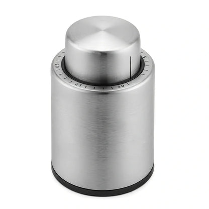 Silver stainless steel vacuum wine stopper, 4.1cm x 5cm x 3.1cm, preserves freshness by removing air from standard bottles