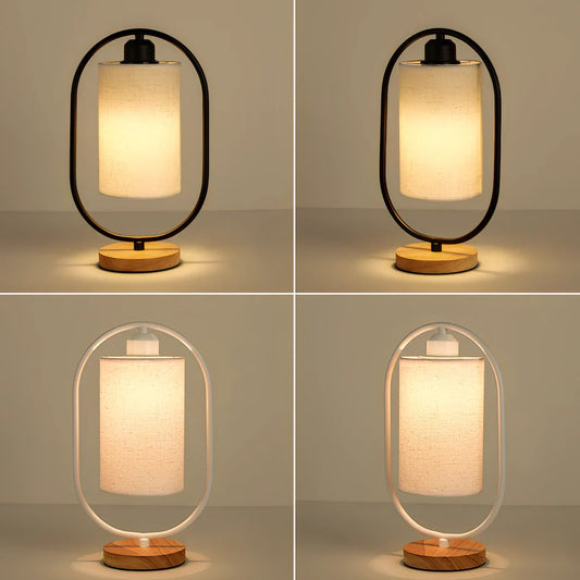 Black metal bedside lamp with dimming button and 5W LED warm light on wooden table