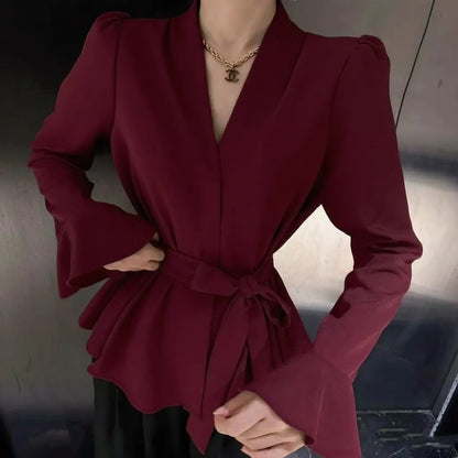 Women's French-style irregular collar long sleeve tied shirt in black with bell sleeves and tied front