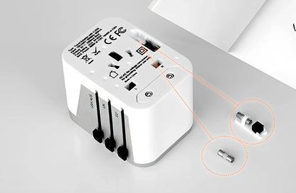 Black multi-country travel adapter 54x68x51mm with universal plugs for 2000W devices in 180 countries